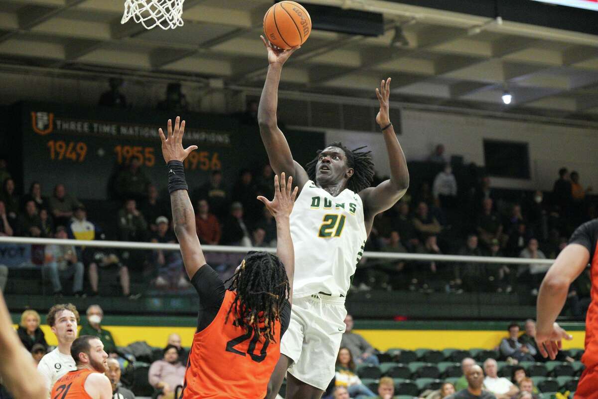 Ndewedo "Chips" Newbury had nine points and 11 rebounds in his season debut for USF on Thursday night.