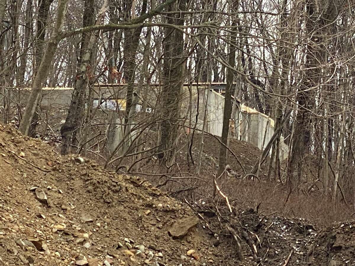 OSHA continues to investigate an incident Friday in which the first floor of a house under construction in Wilton collapsed, causing two workers to be injured, officials say.
