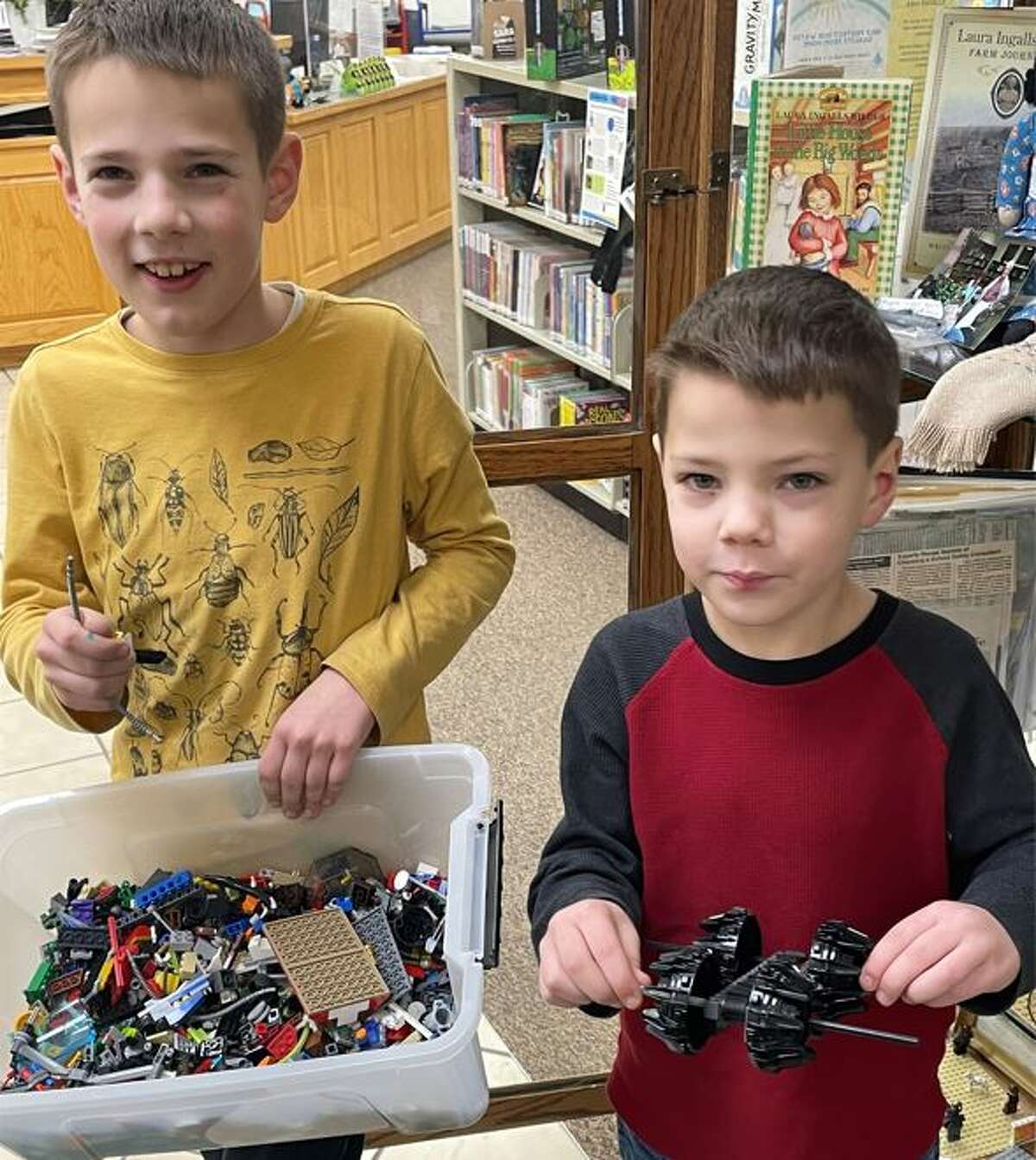 Youngsters get ready to create with LEGO at the Carlinville Public Library, one of many libraries that offer LEGO Clubs. The Carlinville library is joining others worldwide in celebrating International LEGO Day on Saturday, Jan. 28. 