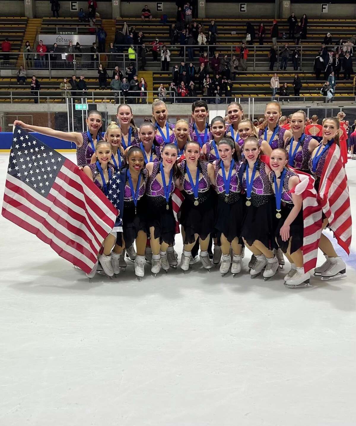 Sam Paris and other members of the Skyliners at the 2023 ISU Challenger Series Synchronized Skating, in Neuchâtel, Switzerland, where they took the bronze medal. 