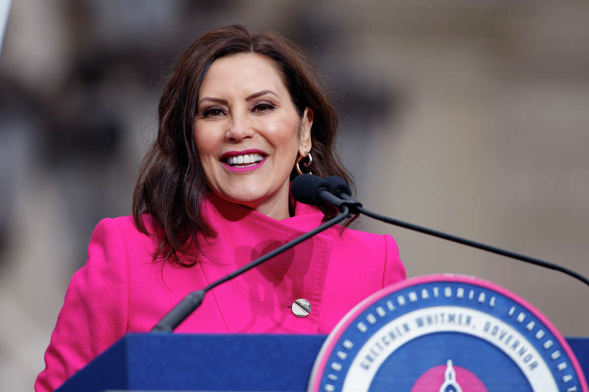FILE- Michigan Gov. Gretchen Whitmer addresses the crowd during inauguration ceremonies on Sunday, Jan. 1, 2023, outside the state Capitol in Lansing, Mich. 