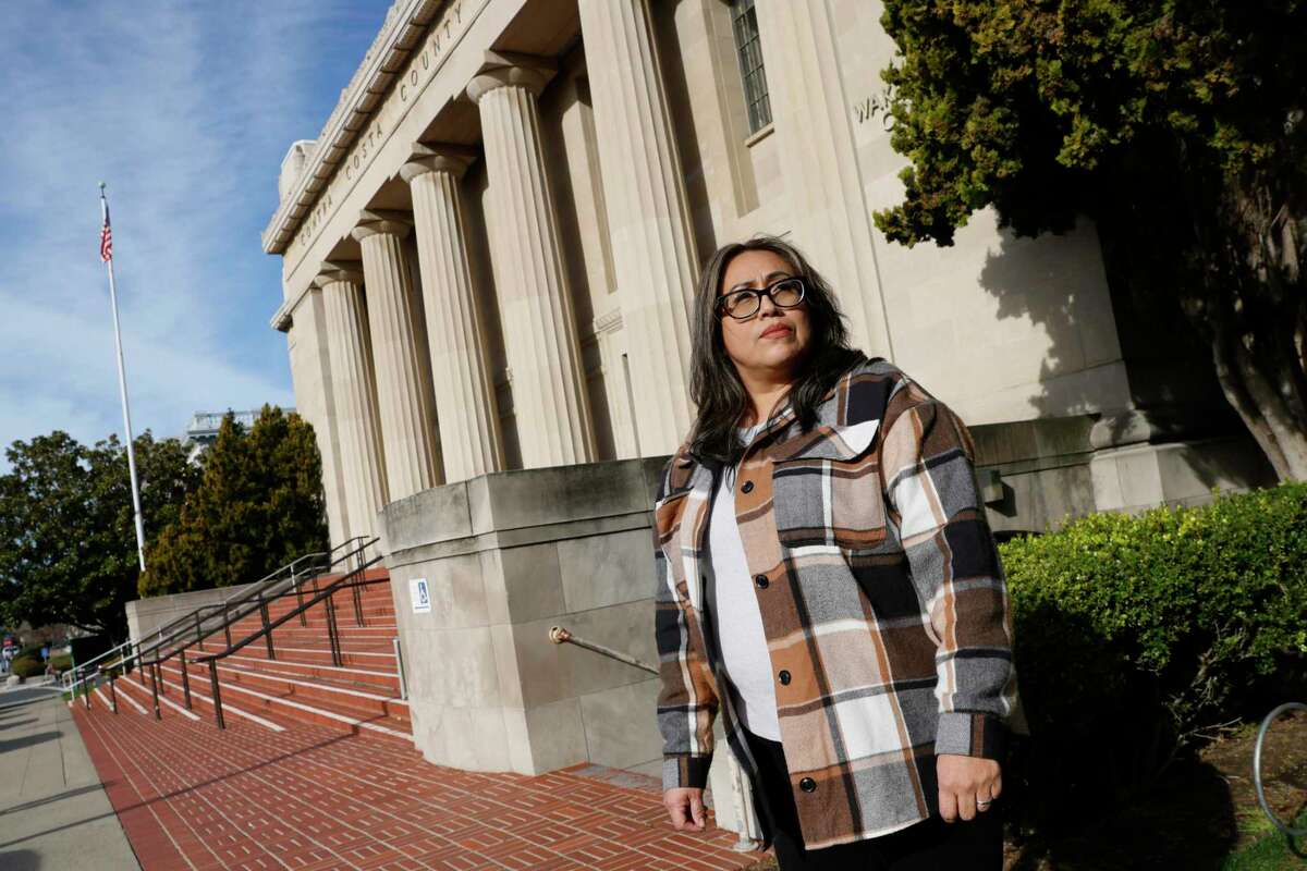 Betty Gabaldon stands outside of the Contra Costa County courthouse in Martinez where, earlier this year, she monitored eviction hearings as part of the Eviction Court Watch program. The program was launched last year by four organizations that have worked to preserve stable and affordable housing for low-income residents of Contra Costa County, including the East Bay Alliance for a Sustainable Economy.