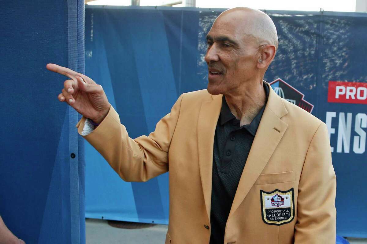 FILE - In this Aug. 3, 2019, file photo, former NFL player Tony Dungy is introduced before the induction ceremony at the Pro Football Hall of Fame in Canton, Ohio. Pro football is discovering that the spirit of the Rooney Rule is being violated. NFL Commissioner Roger Goodell made that a point of emphasis in his state of the league speech during Super Bowl week. So count on Goodell finding ways to more strongly implement the policy that requires teams to interview minority candidates for coaching and executive positions.(AP Photo/Ron Schwane, File)