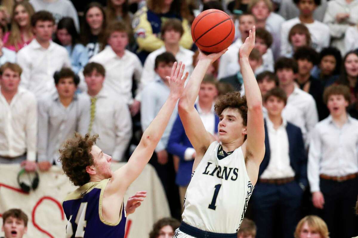 Lake Creek shooting guard Jett Sutton (1) shoots over \Montgomery small forward Zach MCcarter (34) in the fourth quarter of a District 21-5A high school basketball game at Lake Creek High School, Friday, Jan. 20, 2023, in Montgomery.