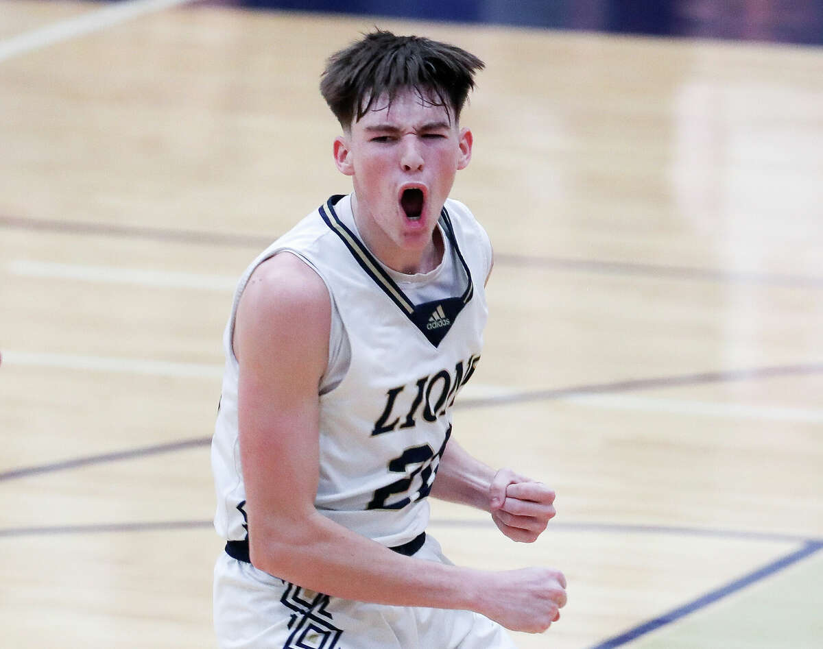 Lake Creek point guard Braedon Bigott (20) reacts after hitting a 3-pointer in the third quarter of a District 21-5A high school basketball game at Lake Creek High School, Friday, Jan. 20, 2023, in Montgomery.