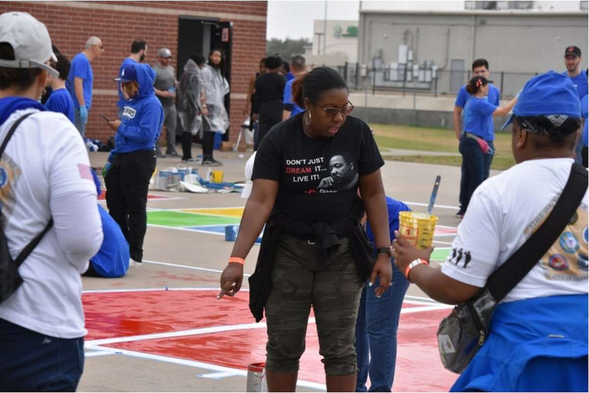 Volunteers participate in MLK Day of Service at Youngblood Intermediate School in Alief.
