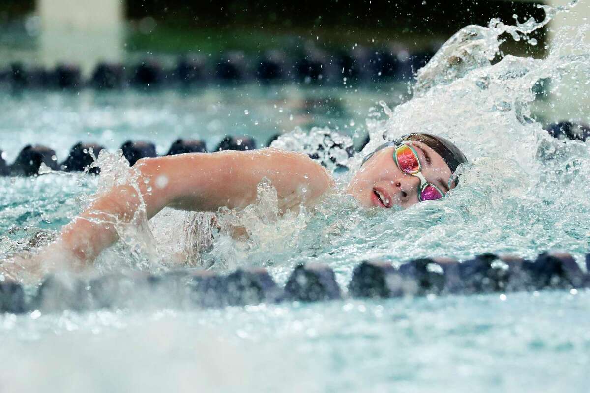 Marley Lovick of College Park competes in the girls 100-yard freestyle during the District 13-6A swim meet at the Conroe ISD Natatorium, Saturday, Jan. 21, 2023, in Shenandoah.