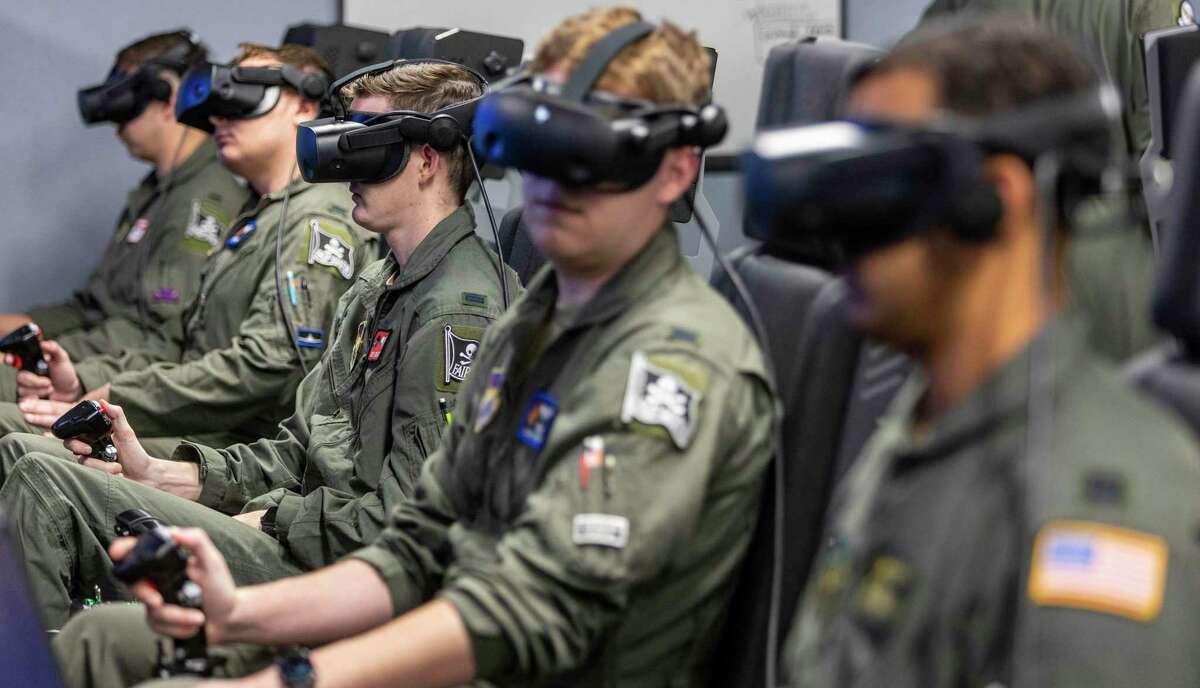 Air Force aviators training to be instructor pilots use immersive training devices at Joint Base San Antonio-Randolph on Jan. 11. The Air Force has integrated such virtual reality simulators into its novice pilot training.