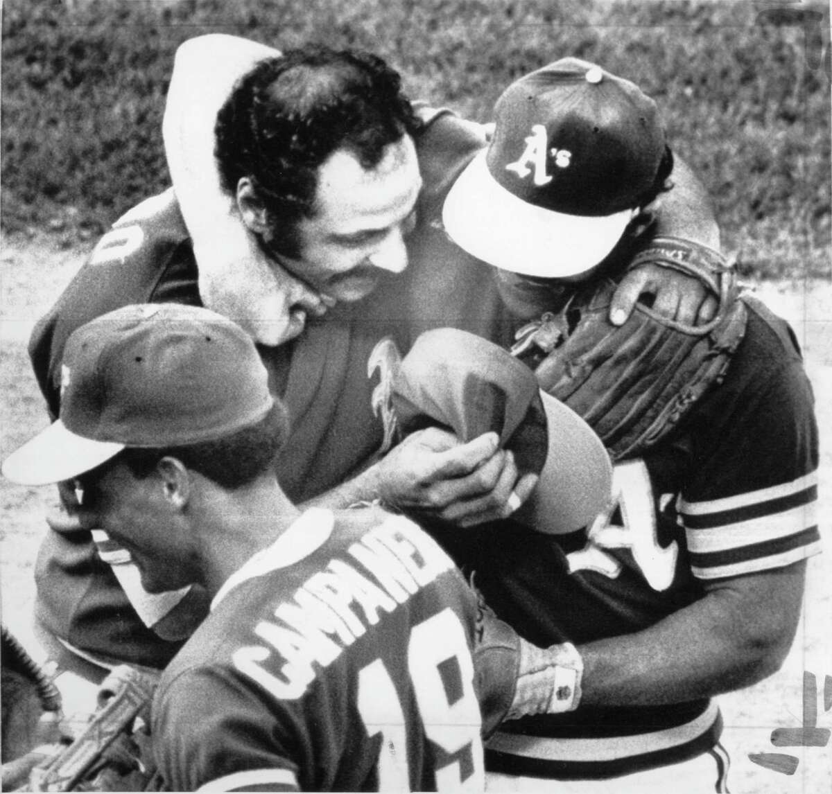 Oakland Athletics players Campy Campaneris, Sal Bando, without cap, and Gene Tenace celebrate after defeating the Baltimore Orioles October 7, 1973 Photo ran 10/08/1973, p. 45 United Press International photo