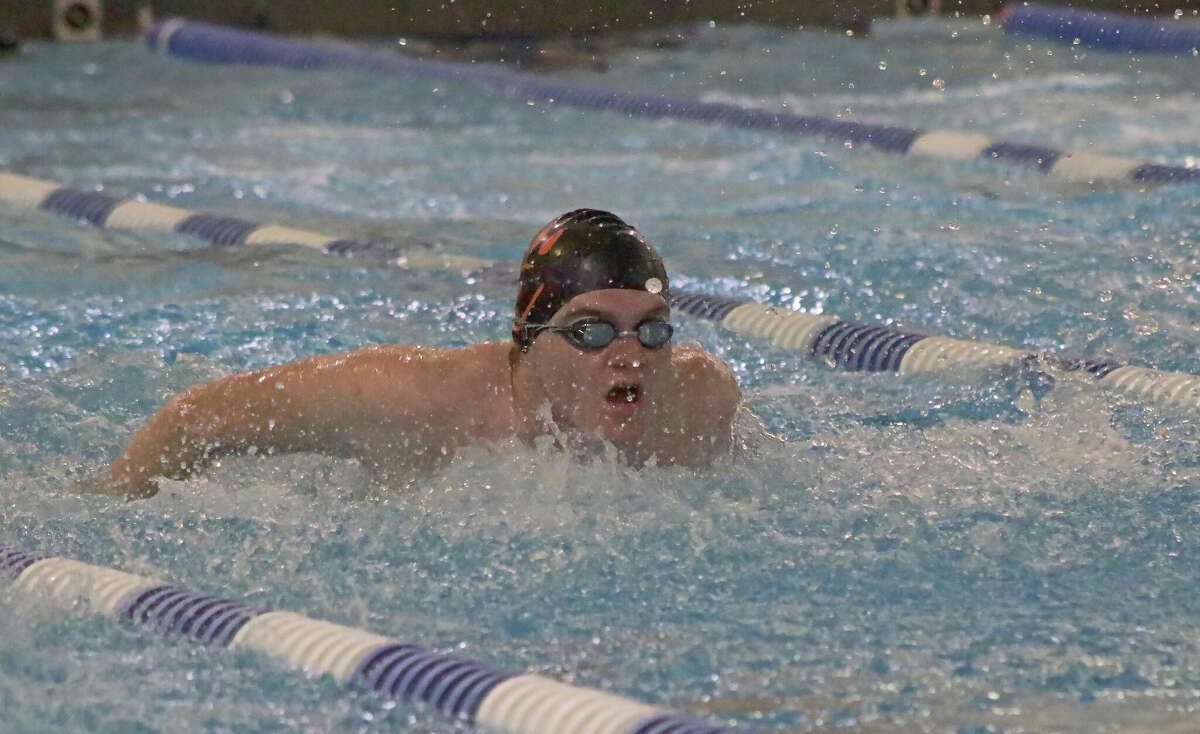 Ryan Schlechte swims to an eighth-place finish in the 50-yard butterfly on Saturday at the Chuck Fruit Aquatic Center. 