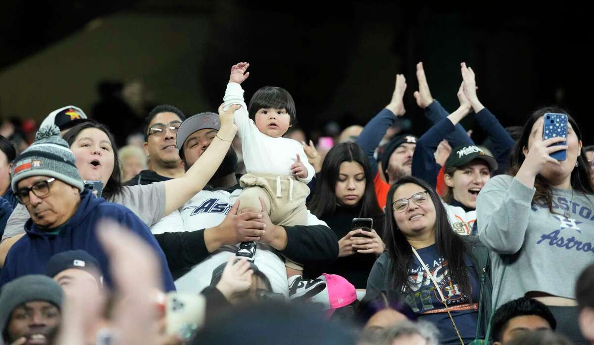 Fans scream for Jose Altuve and Alex Bregman during a fan forum during the Astros FanFest at Minute Maid Park on Saturday, Jan. 21, 2023 in Houston.