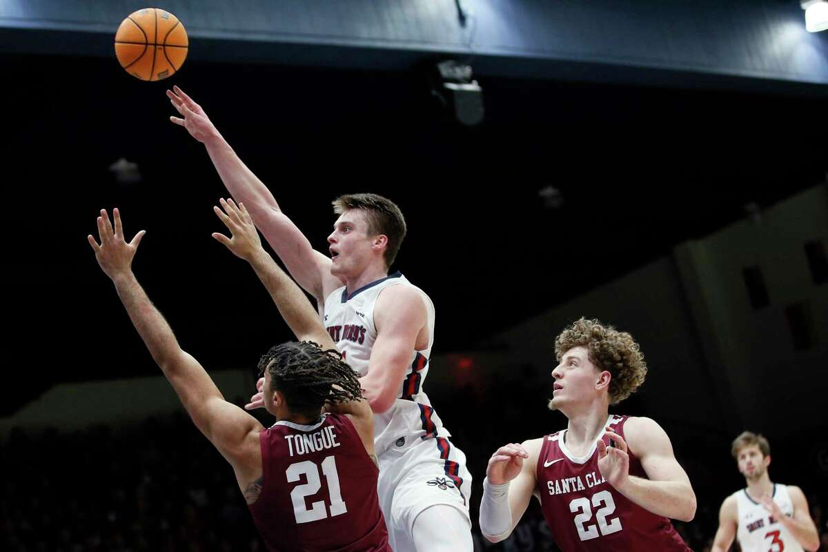 St. Mary's Gaels center Mitchell Saxen (11) scores against the Santa Clara Broncos in the second half during a men’s basketball game at University Credit Union Pavilion in Moraga, Calif., Saturday, Jan. 21, 2023.