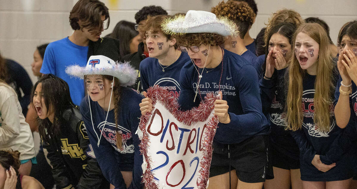 FULSHEAR TX -JANUARY 21: Tompkins students cheer on their swimmer during the District 19-6A swimming championships at Jordan High School January 21, 2023 in Fulshear,Texas.