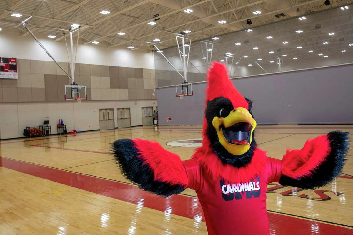 Gavino Garcia, 14, is pictured as his school’s mascot, Coco the Cardinal, at St. Matthew Catholic School Athletic Center on Thursday. Performing as St. Matthew Catholic School’s mascot Coco the Cardinal is more than hilarity, hijinks and high fives for Gavino — it’s been his dream since he was 4. Earlier this month, Gavino, a National Cheerleaders Association All-American Mascot, represented San Antonio at the Citrus Bowl in Florida.