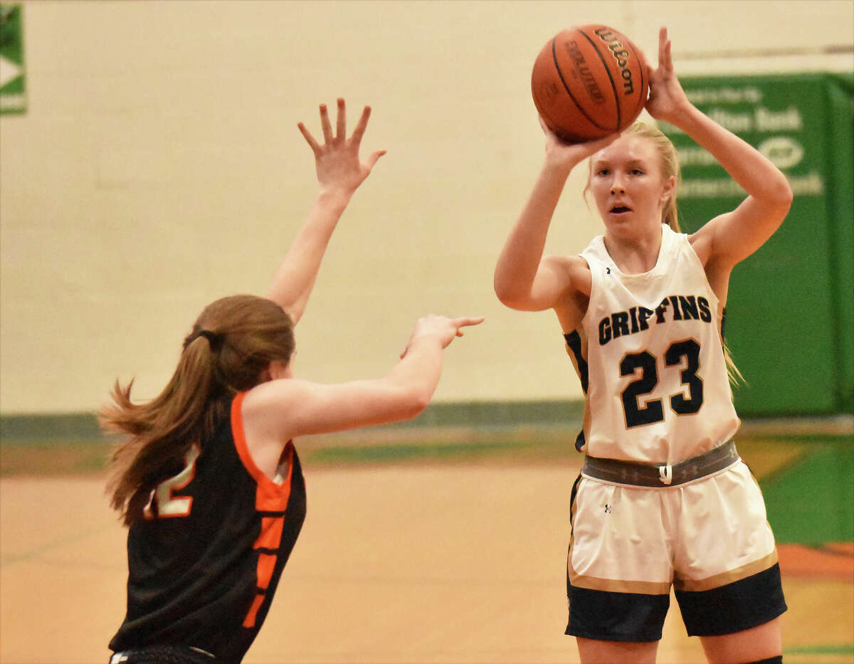 Father McGivney's Sami Oller puts up a jumper against Greenfield on Saturday in the first round of the Lady Hawks Invitational in Carrollton.