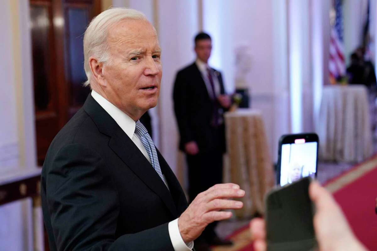 FILE - President Joe Biden talks with reporters after speaking in the East Room of the White House in Washington, Jan 20, 2023. Senior Democratic lawmakers turned sharply more critical Sunday of President Joe Biden's handling of classified materials after the FBI discovered additional items with classified markings at Biden's home.