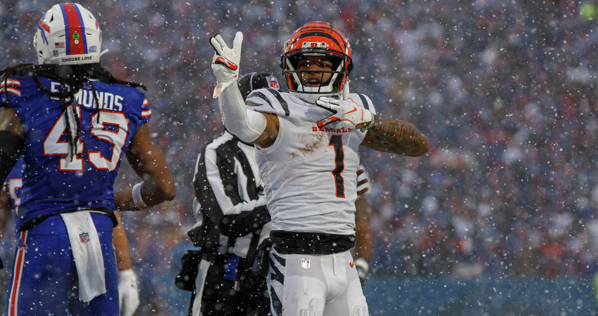 Cincinnati Bengals wide receiver Ja'Marr Chase (1) signals for a first down during an NFL divisional round playoff football game Sunday, Jan. 22, 2023, in Orchard Park, NY. (AP Photo/Matt Durisko)