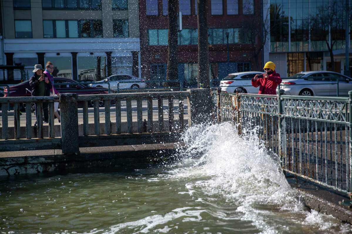 The king tide, the highest tide of the year coming in at a little over 7 feet, splashes along the Embarcadero in San Francisco.