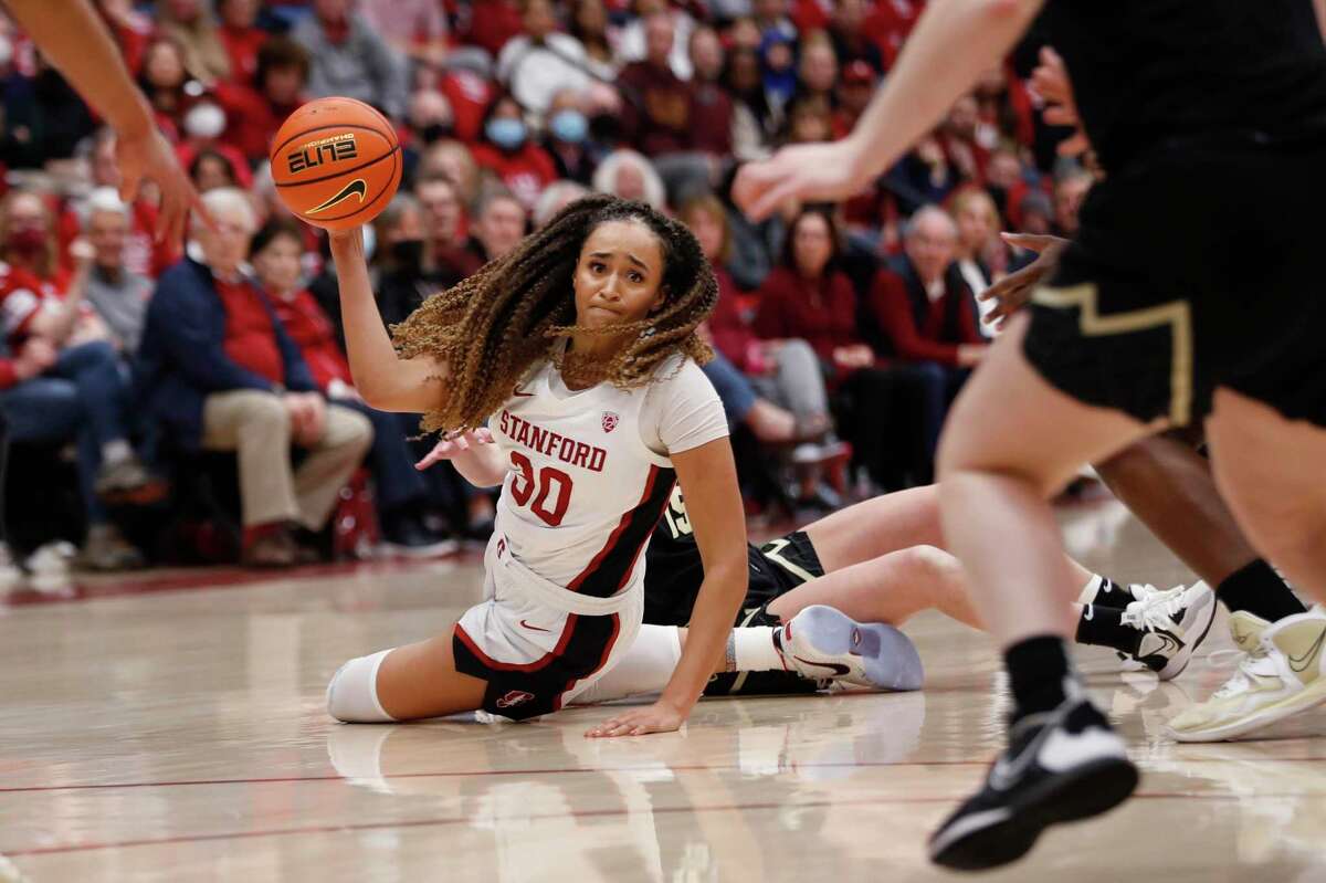 Stanford guard Haley Jones (30), who had 11 points and a season-high 18 rebounds, passes the ball against Colorado during the first quarter.