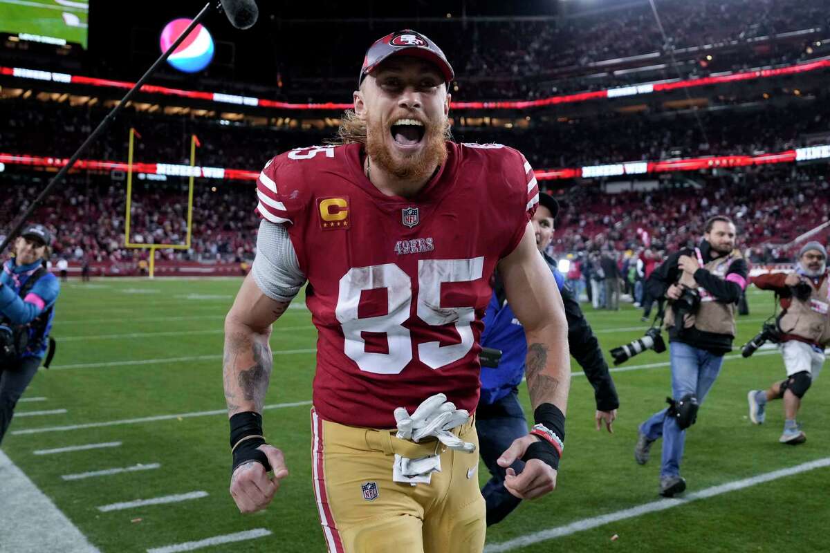 San Francisco 49ers tight end George Kittle (85) celebrates after an NFL divisional round playoff football game against the Dallas Cowboys in Santa Clara, Calif., Sunday, Jan. 22, 2023.