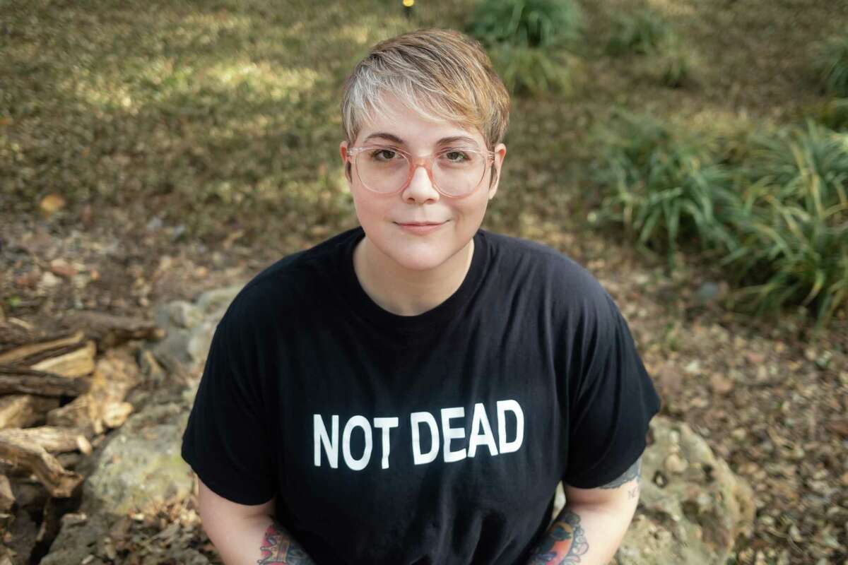 Alicia Rowe, who read about her own death online, in a story about her parents, poses for a portrait outside of her home in Austin, Texas on Jan. 21, 2023.