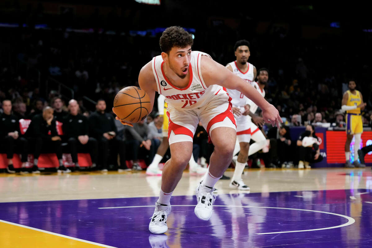 Houston Rockets' Alperen Sengun (28) grabs the ball during the first half of an NBA basketball game against the Los Angeles Lakers, Monday, Jan. 16, 2023, in Los Angeles. (AP Photo/Jae C. Hong)
