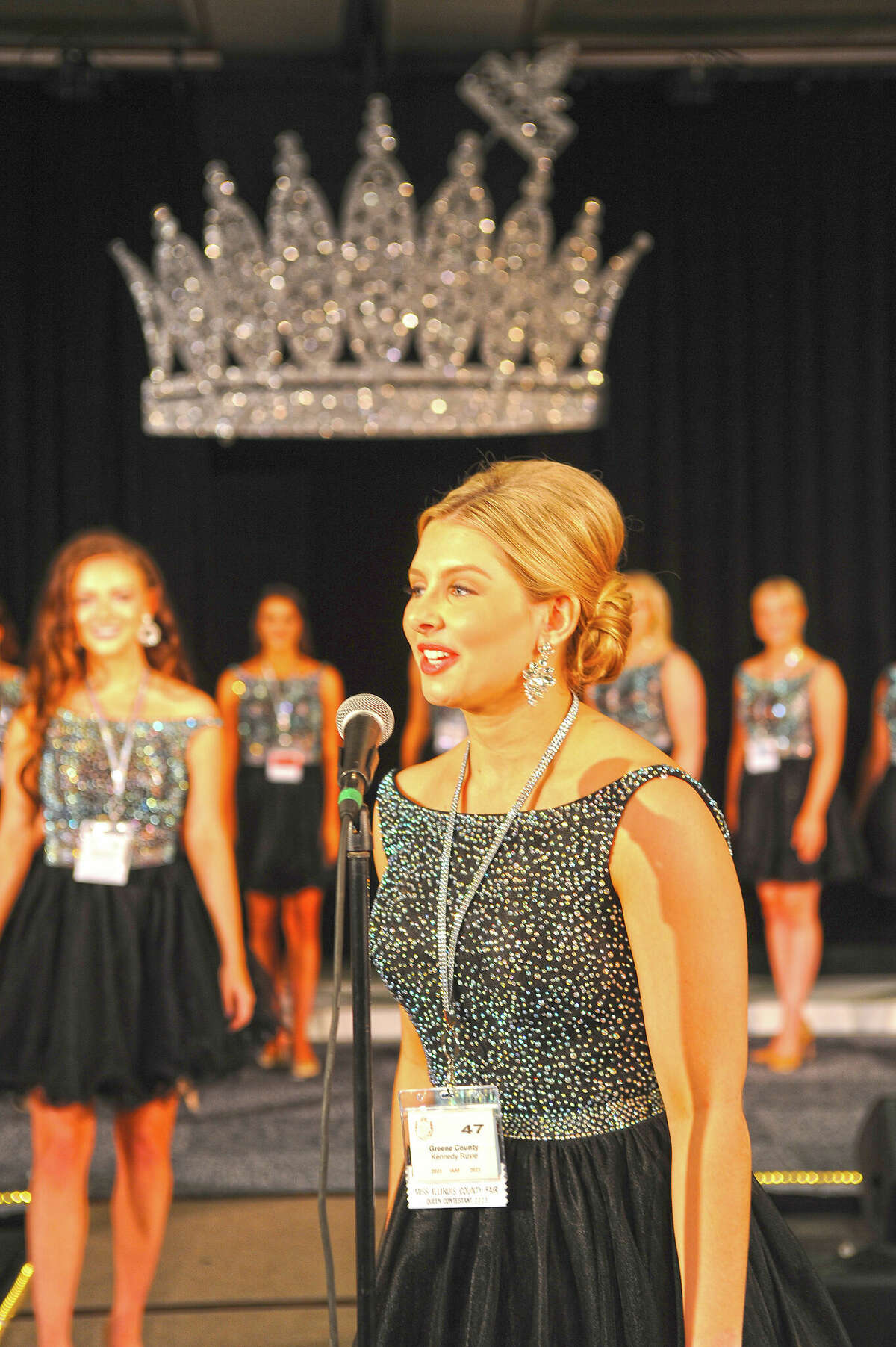 Miss Greene County Fair Kennedy Ruyle introduces herself to the other contestants during the 2023 Miss Illinois County Fair Queen Pageant.