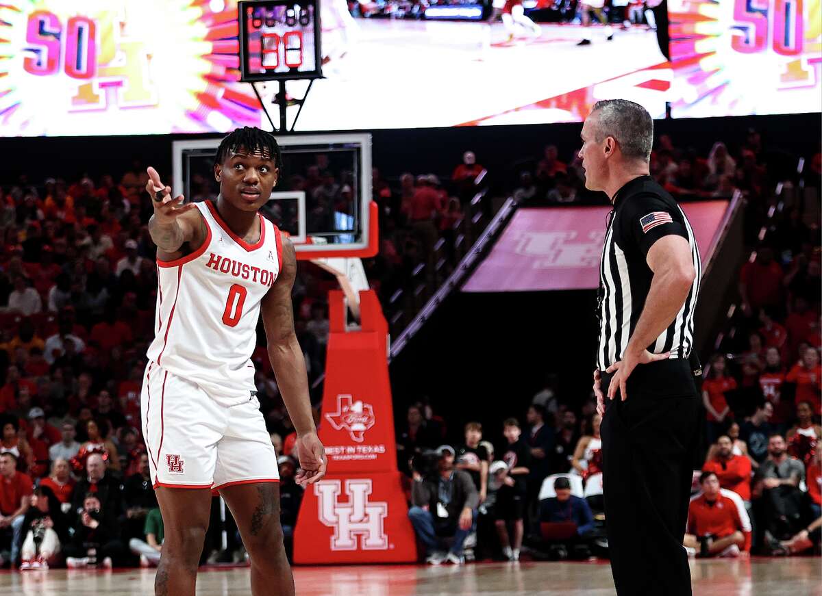 Marcus Sasser #0 of the Houston Cougars argues with the referee after being called for a foul against the Temple Owlsduring the first half at Fertitta Center on January 22, 2023 in Houston.