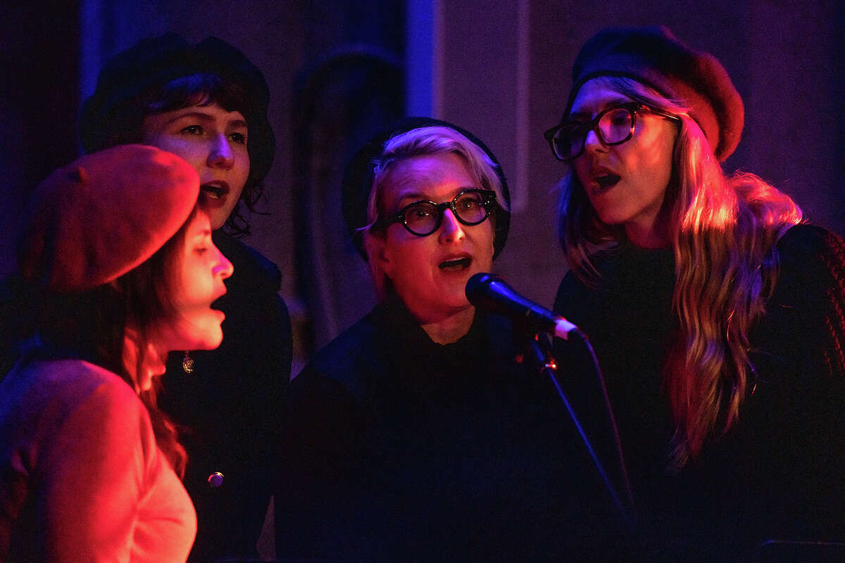 A choir sings backup vocals for Cold Beat as they perform inside Grace Cathedral in San Francisco, Calif. on January 20, 2023.