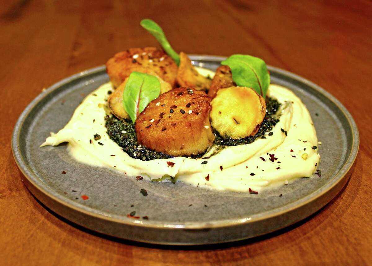 Scallops with parsnip purée is among the eight courses of food that will be paired with beer from Troy's Rare Form Brewing during a dinner on Jan. 28 at Northern Barrell, a Voorheesville restaurant.