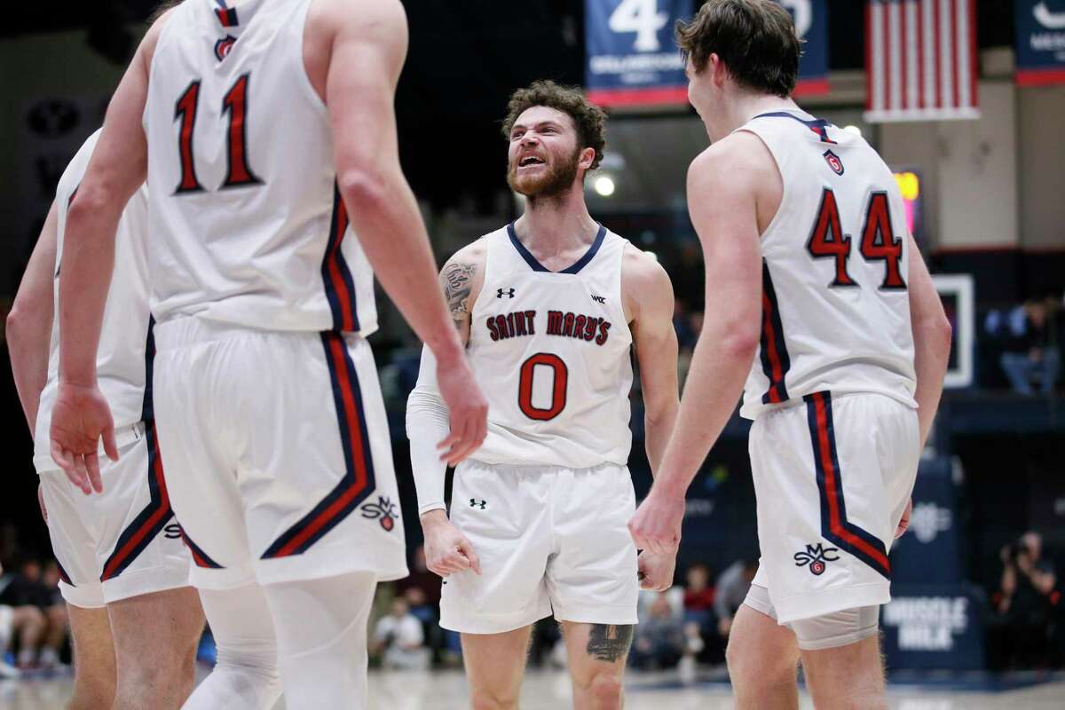St. Mary's Gaels guard Logan Johnson (0) reacts after being fouled while scoring a two-point shot against the Santa Clara Broncos in the second half during a men’s basketball game at University Credit Union Pavilion in Moraga, Calif., Saturday, Jan. 21, 2023.