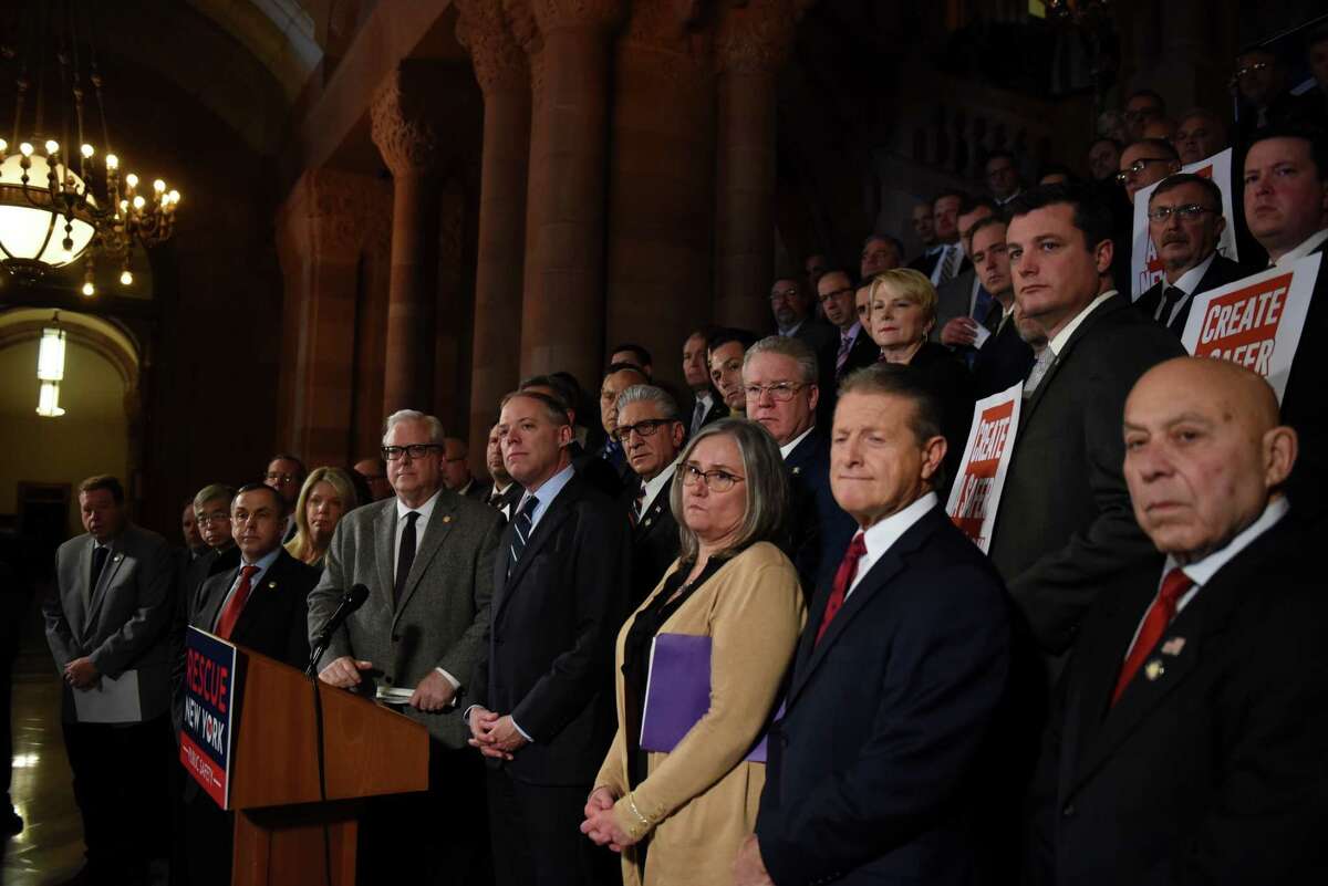 State Sen. Thomas F. O’Mara, center left, and Assembly Minority Leader William Barclay, center right, lead a state GOP press conference to outline legislative measures aimed at increased public safety on Monday at the Capitol in Albany.