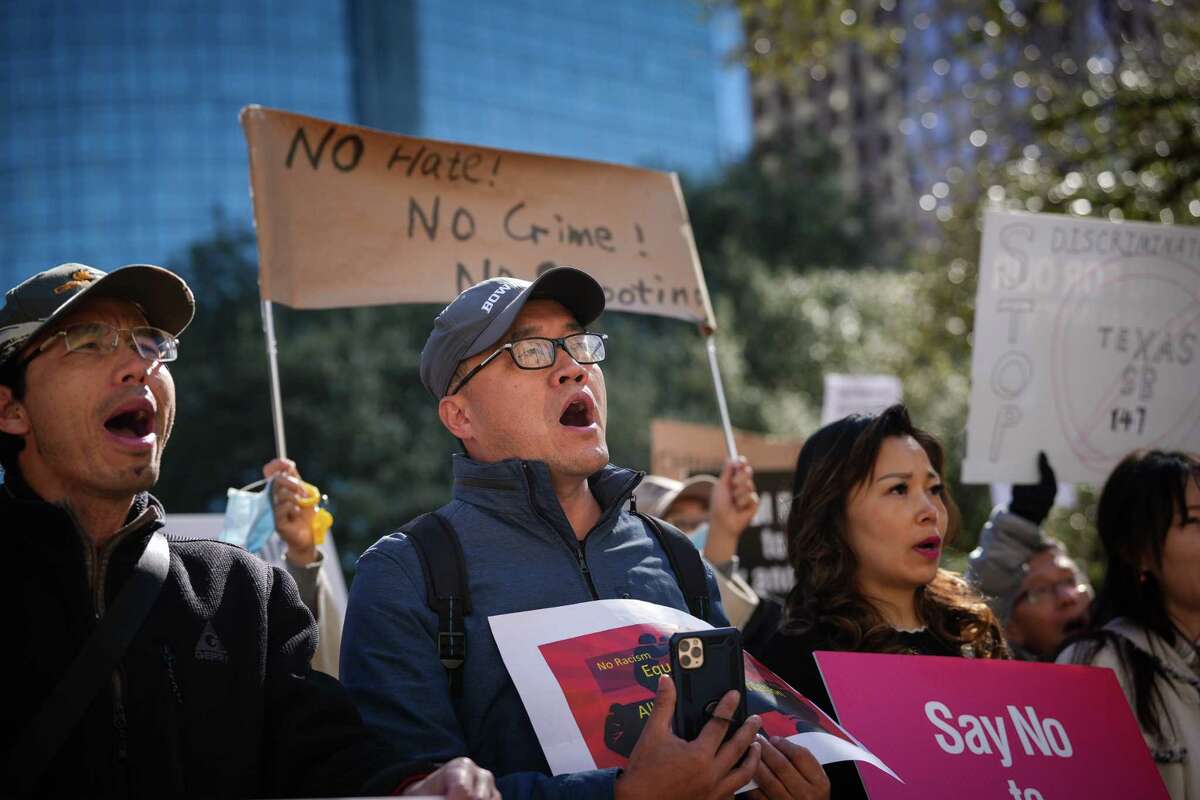 Brian Liu, center, protests against SB 147 on Monday, Jan. 23, 2023, at Houston City Hall in Houston. “How can they promote this kind of thing,” he asked about state leaders.