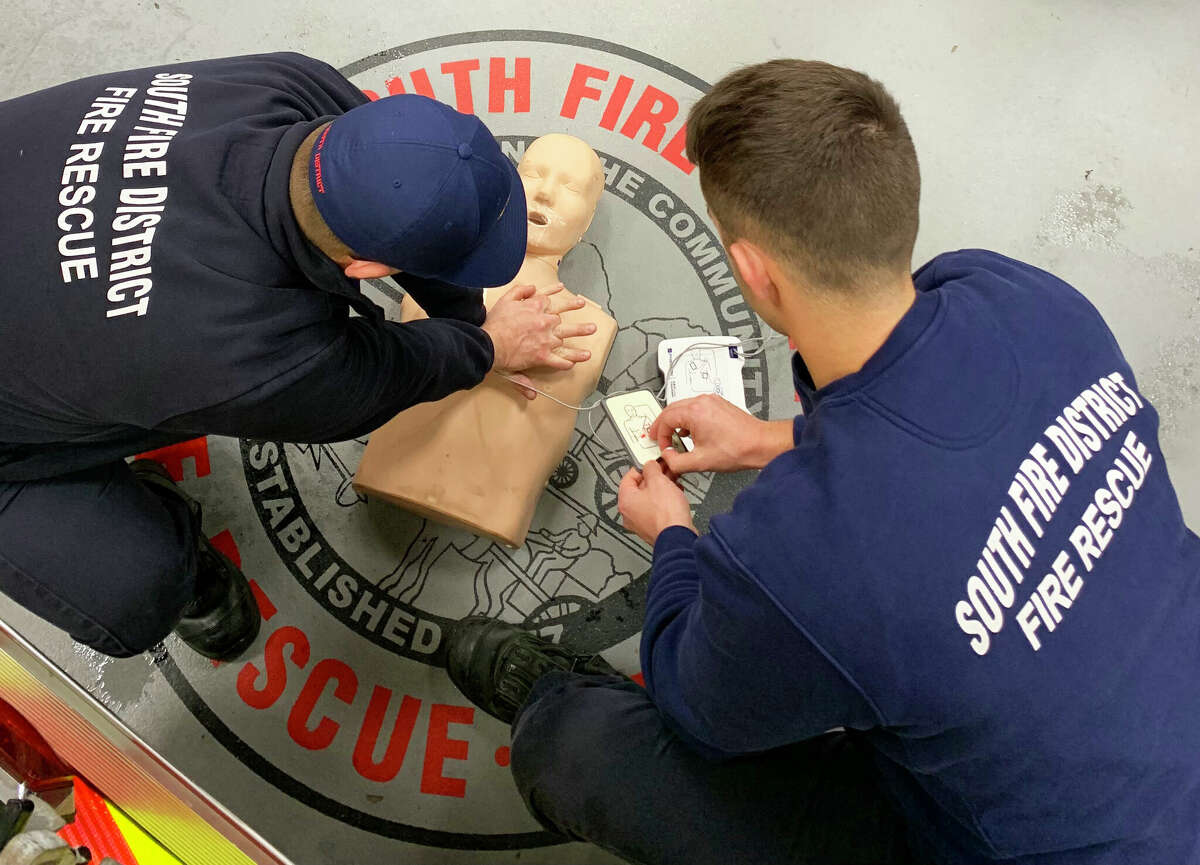 Middletown South Fire District personnel demonstrate CPR and an AED on a dummy. The station, at 445 Randolph Road, will host free training for the layman Jan. 28 from 10 a.m. to 2 p.m.
