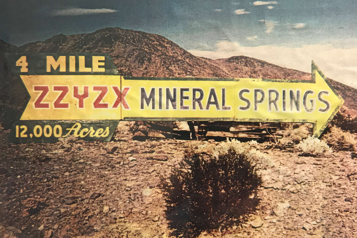 Sign on I-15 at the end of Zzyzx Road, from the Curtis Springer era.
