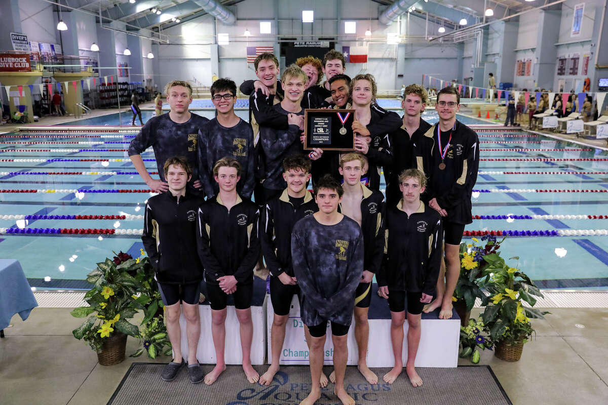 The Andrews boys swimming & diving team celebrates its District 3-4A championship, Jan. 20 at Pete Ragus Aquatic Center in Lubbock. 