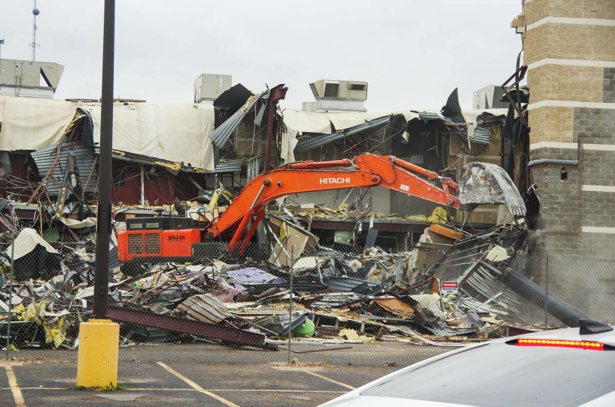 Demolition crews began tearing down the building which formerly housed  Cinemark Movies 12 on Monday, Jan. 23.