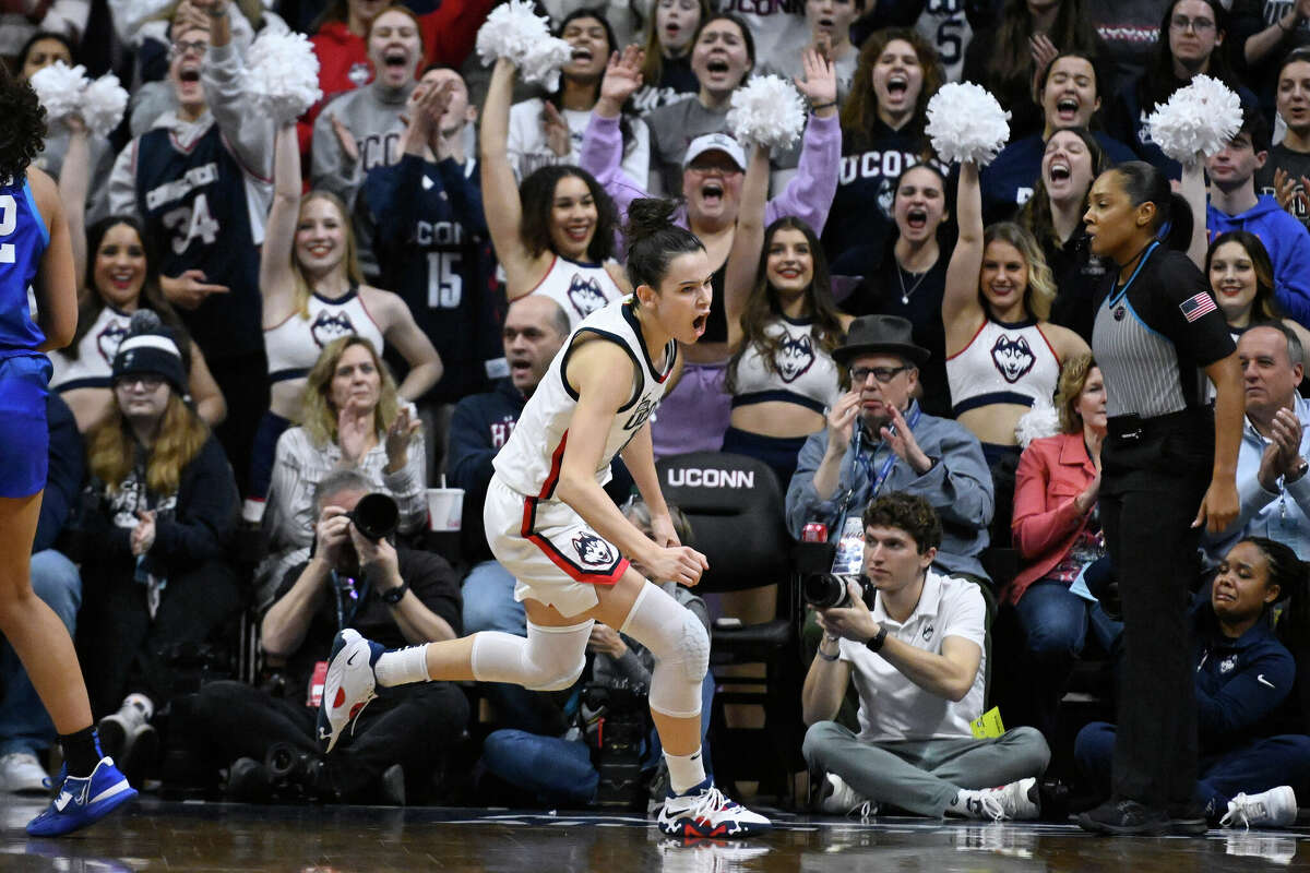 UConn's Lou Lopez-Senechal reacts after making a basket in the first half of an NCAA college basketball game against DePaul, Monday, Jan. 23, 2023, in Storrs, Conn. (AP Photo/Jessica Hill)