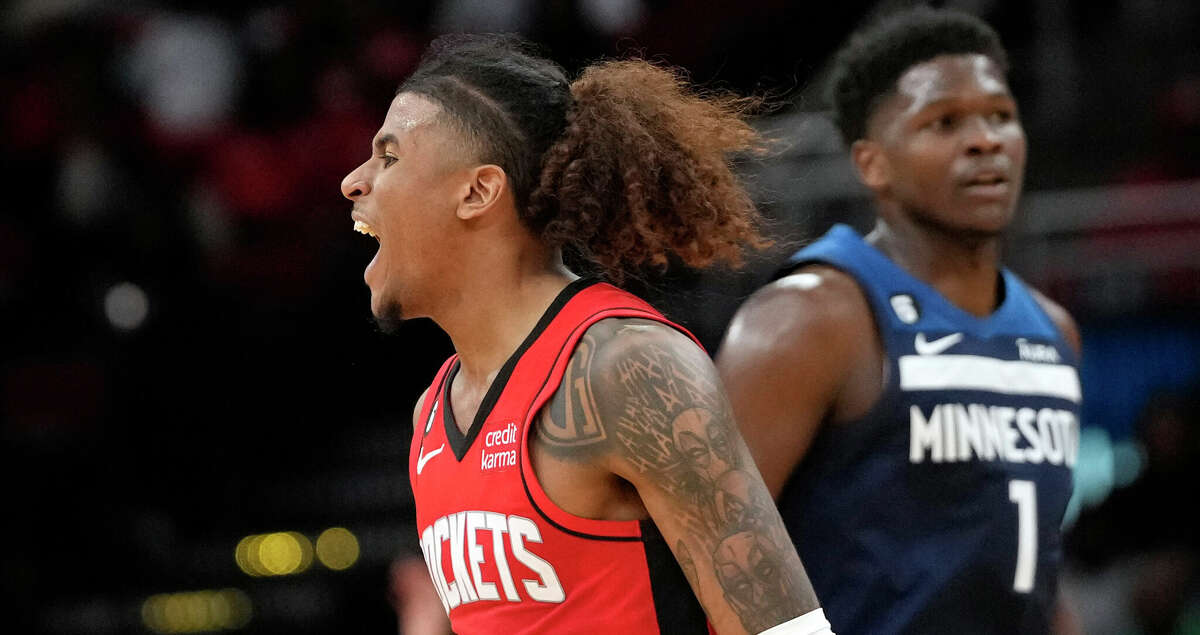 Houston Rockets' Jalen Green (4) celebrates after making a basket against the Minnesota Timberwolves during the second half of an NBA basketball game Monday, Jan. 23, 2023, in Houston. The Rockets won 119-114. (AP Photo/David J. Phillip)