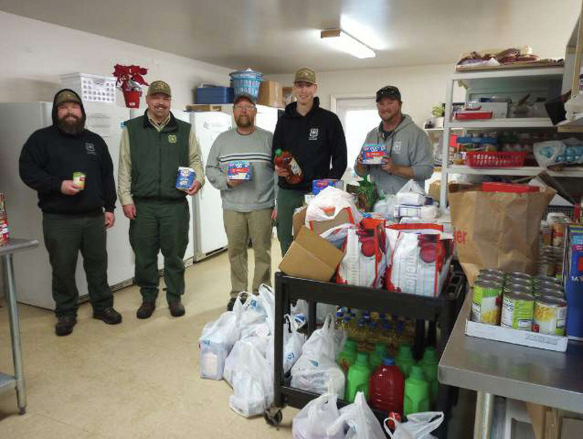 A polar plunge food drive has become an annual tradition and way for members of the Huron-Manistee National Forest Service to give to their communities. 