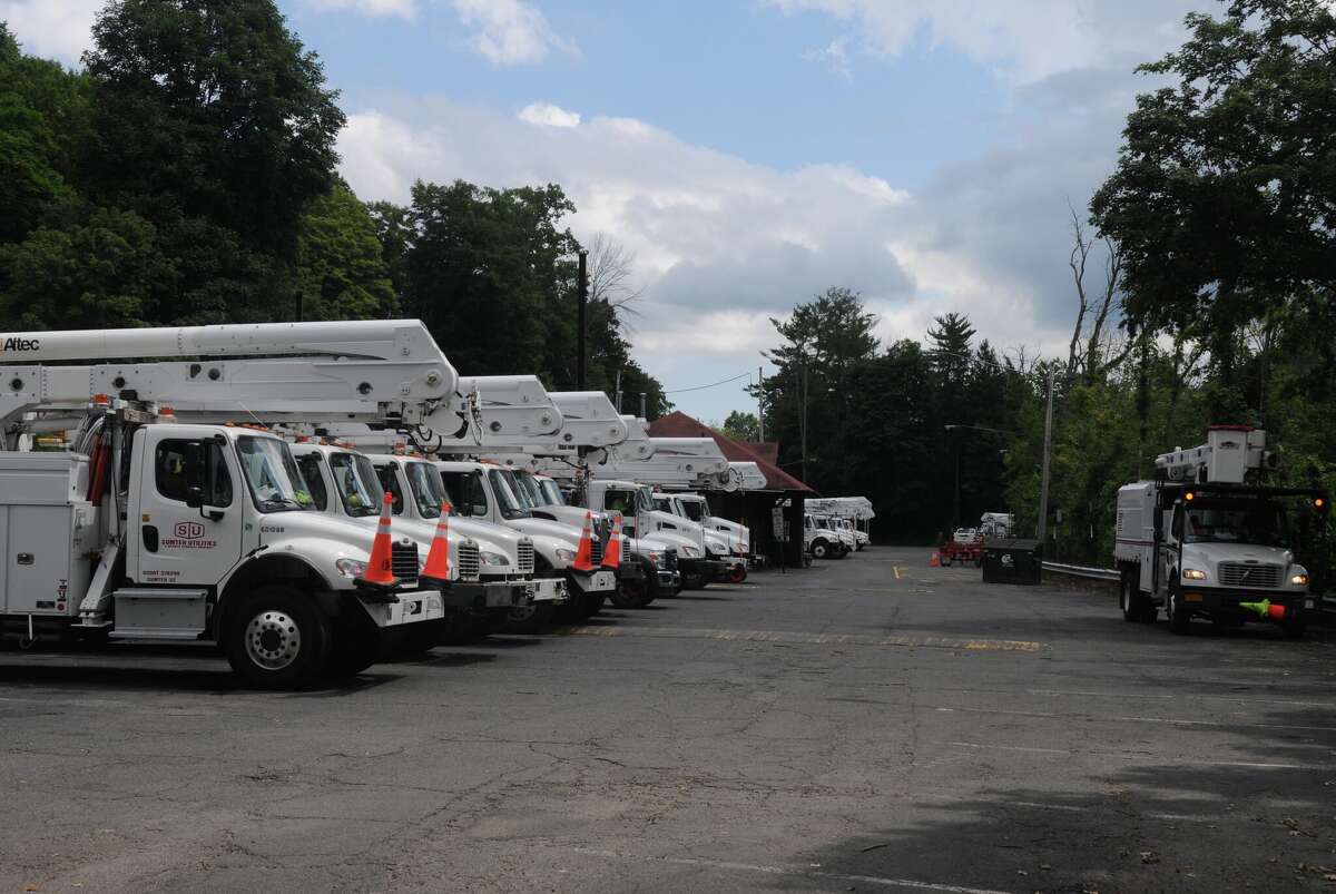 Utility trucks in Connecticut after a recent storm. 