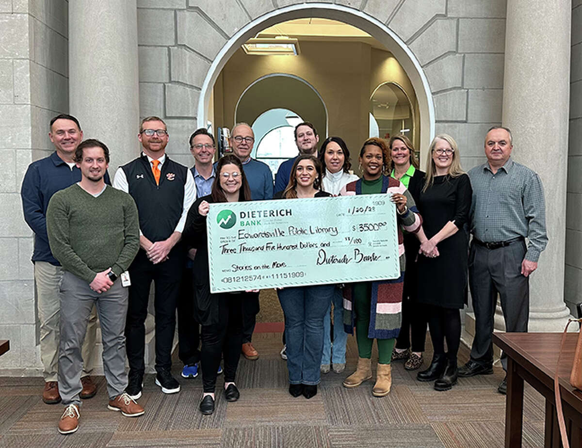 Dieterich Bank donated $3,500 to the Edwardsville Public Library to restart the Stories on the Move program, which puts books donated by the library on 15 District 7 buses.