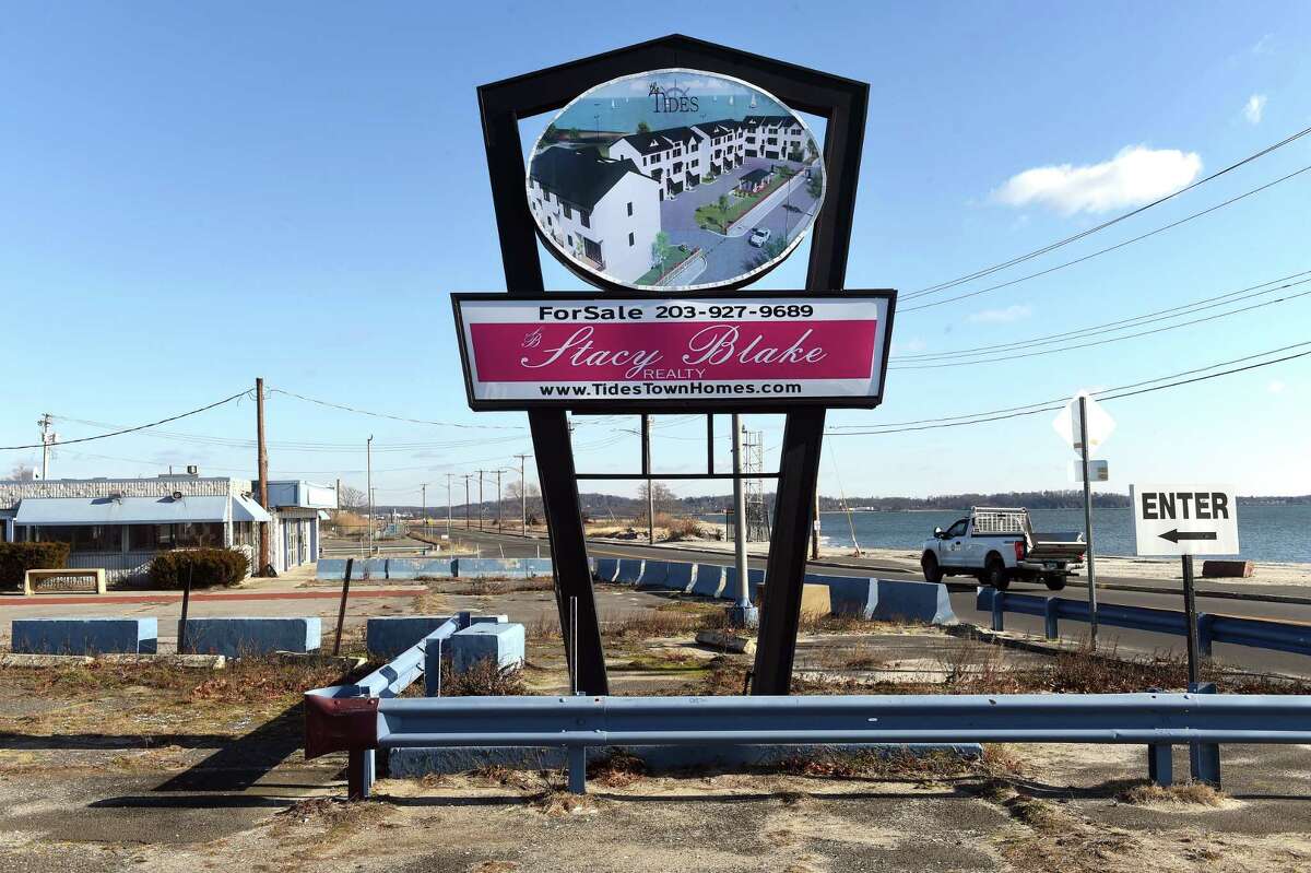 Signs for the Tides town homes and Stacy Blake Realty have replaced the Chick's Seafood Restaurant sign on Beach Street in West Haven as photographed on January 24, 2023.