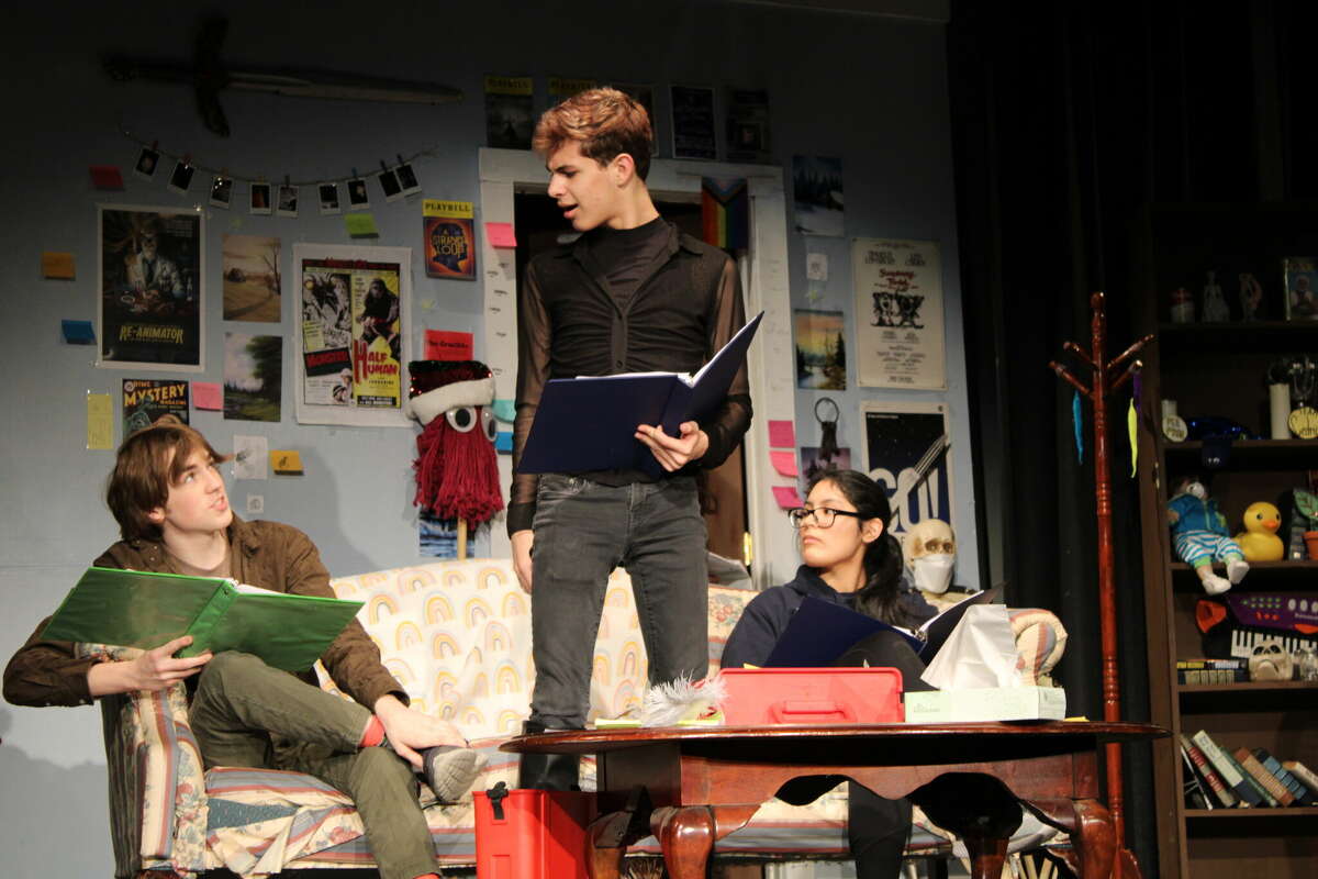Torrington High School students rehearse for "Sawyer Logan Is Doing Just Fine," written by student Maia Wood. Jozsef Herczeg center, playing Armani Matthews, gets into character in a scene alongside other cast members, including Emily Tacuri Penaranda as "Elliot McLord, right. 