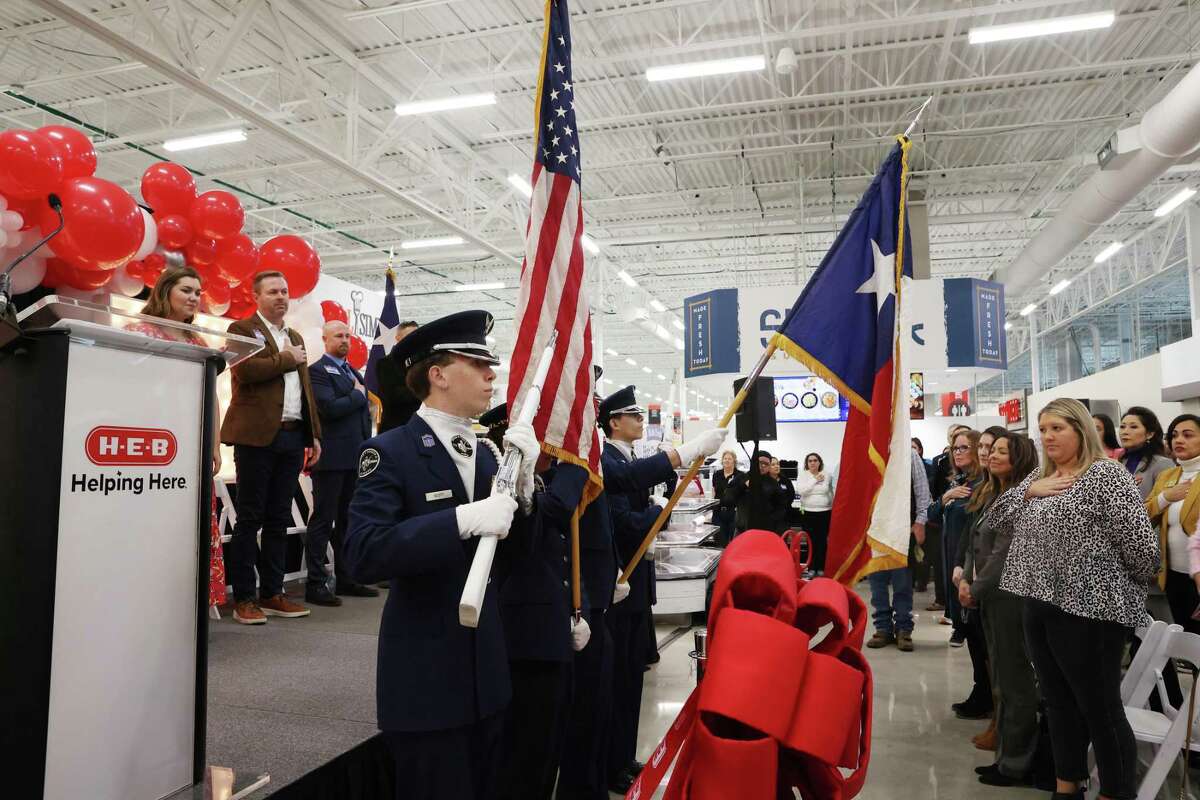 The Steele High School Honor Guard presents the colors during a ribbon cutting and tour of the new Cibolo H-E-B, Tuesday, Jan. 24, 2023. The 110,000 square-foot store is schedule to open to the public on Wednesday.