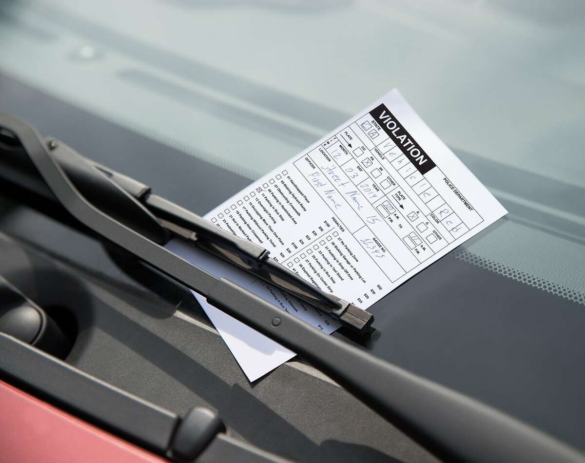 Parking ticket on car windshield. Photo Credit: Andrey_Popov/Shutterstock.