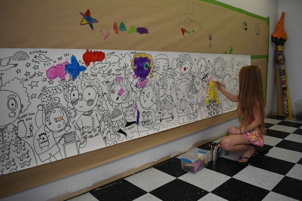 A Kid's Community Mural by Magaly Ohika and Artroom Atelier at the Litchfield Hills Creative Festival. 