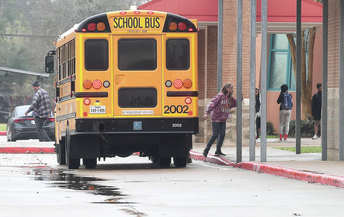 Students board a bus after early dismissal at Martin Luther King, Jr., Middle School as heavy storms with high winds moved through the region Tuesday afternoon. Districts throughout the Golden Triangle held early dismissals in advance of the storms' arrival. Photo made Tuesday, January 24, 2023 Kim Brent/Beaumont Enterprise