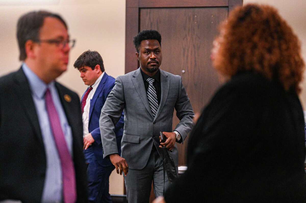 Air Force Reserve Maj. Andre McDonald takes a break during the second day of his trial for the murder of his wife, Andreen McDonald, whom he is accused of killing in 2019.