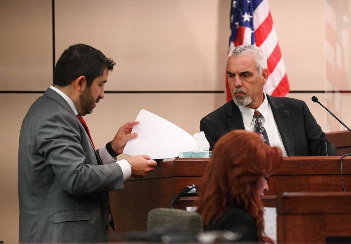 Prosecutor Ryan Groom questions Tony Kobryn, investigator for the Bexar County Sheriff’s Office, about information he extracted from a smartphone belonging to Air Force Reserve Maj. Andre McDonald, who is on trial for the murder of his wife, Andreen, who he allegedly killed in 2019.